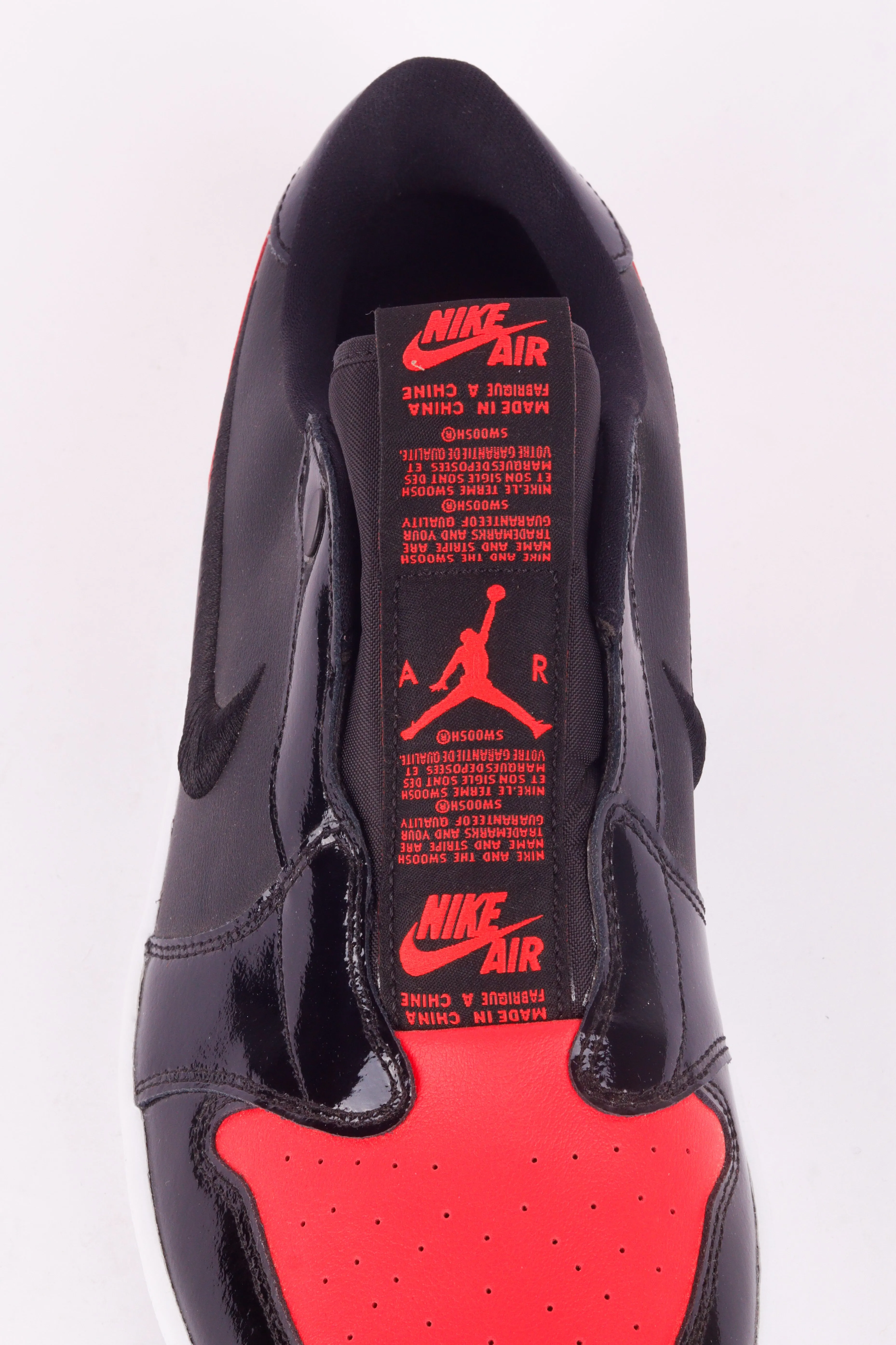 Nike Air Jordan 1 Low Slip Black Hot Punch (Women's)